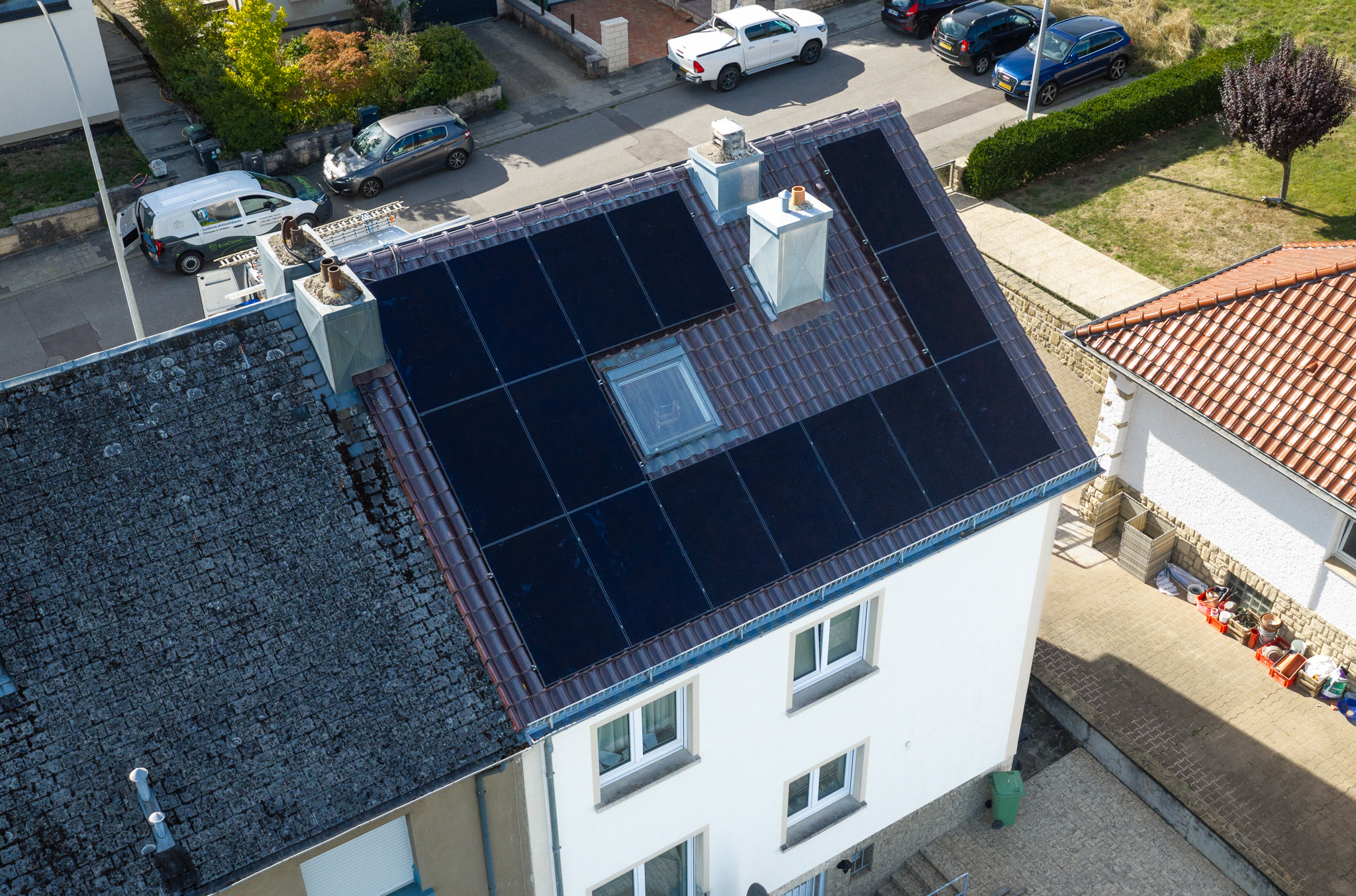 Drone view of a rooftop solar PV installation on a home